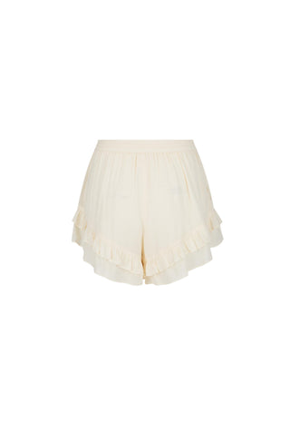 cream-ruffled-shorts-with-a-pleated-layered-skirt-design-shown-against-a-plain-white-background