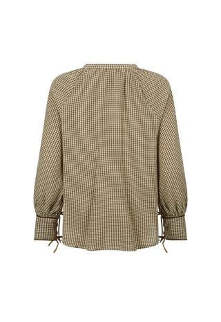 a-long-sleeve-blouse-with-a-small-scale-beige-and-brown-gingham-pattern-featuring-a-gathered-neckline-and-tie-details-at-the-cuffs-shown-against-a-plain-white-background