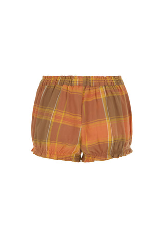 Plaid shorts in a warm autumn palette of orange, brown, and yellow, featuring an elastic waistband and ruffled trim at the leg hems.